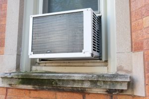 Keep your cool with easy tips to help window AC unit run more efficiently this summer in Dallas. 